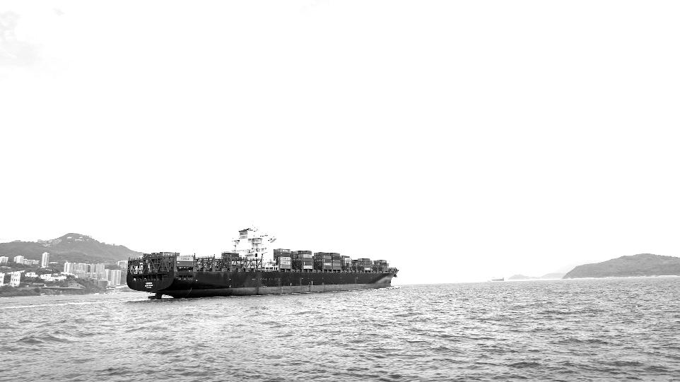 cargo vessel on body of water
