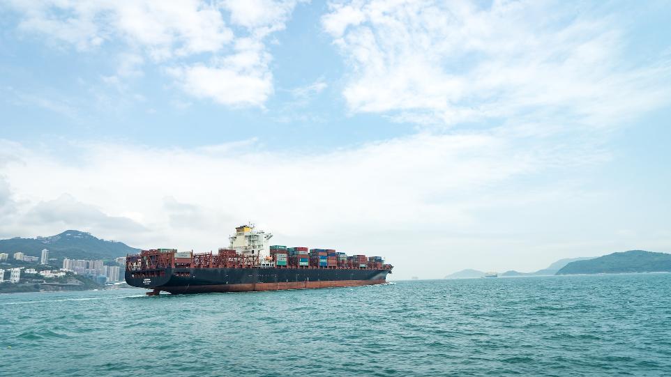 cargo vessel on body of water